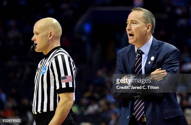 Head coach Billy Kennedy of the Texas A&M Aggies calls to his team againt the Providence Friars during the first round of the 2018 NCAA Men's...