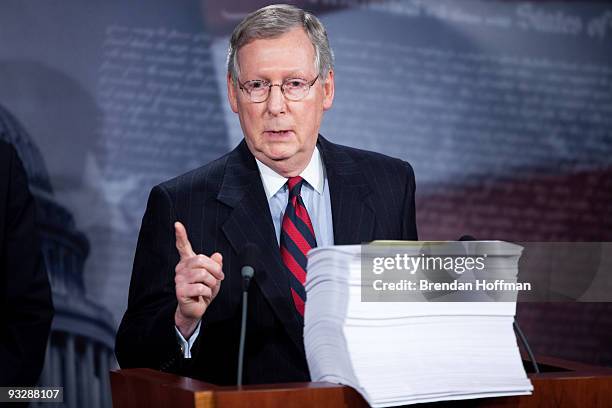 Senate Minority Leader Mitch McConnell , with a copy of the Senate's health care reform legislation in front of him, holds a news conference...