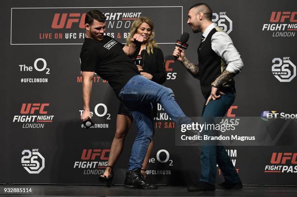 Middleweight Michael Bisping, UFC women's flyweight Paige VanZant and UFC commentator Dan Hardy interact with fans during a Q&A session after the UFC...