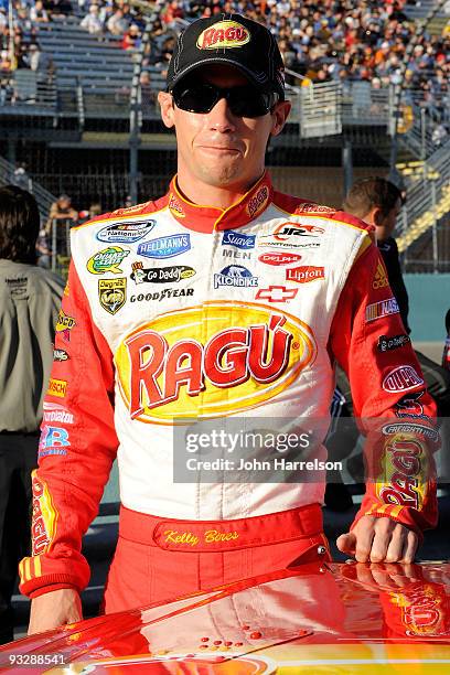 Kelly Bires, driver of the Ragu Chevrolet, stands on the grid prior to the NASCAR Nationwide Series Ford 300 at Homestead-Miami Speedway on November...
