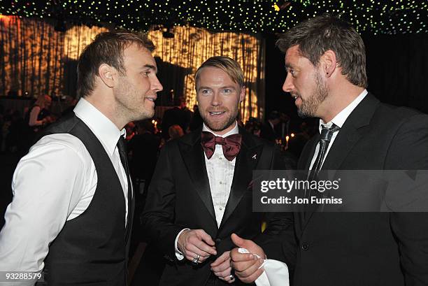 Gary Barlow of Take That talks to Ronan Keating and Keith Duffy of Boyzone at Ronan Keating's fourth annual Emeralds and Ivy Ball in aid of Cancer...