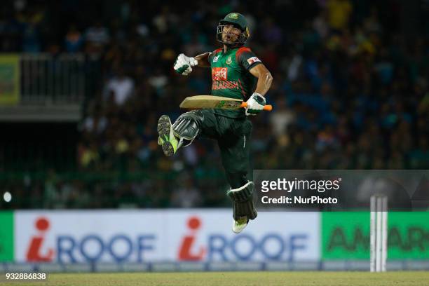 Bangladesh cricketer Mahmudullah Riyad leaps in the air in celebration after winning the 6th T20 cricket match of NIDAHAS Trophy between Sri Lanka...