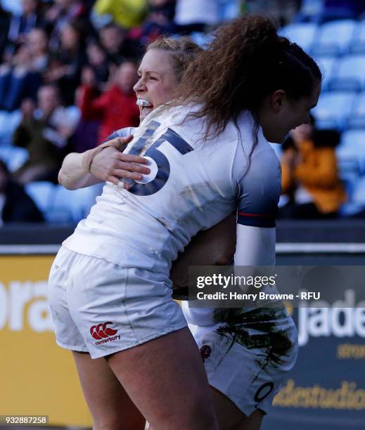 Danielle Waterman of England is congratulated after scoring their first try during the Natwest Women's Six Nations match between England Women and...