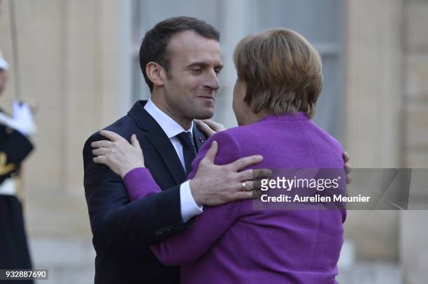 French President Emmanuel Macron receives German Chancellor Angela Merkel at Elysee Palace on March 16, 2018 in Paris, France. Angela Merkel, who...
