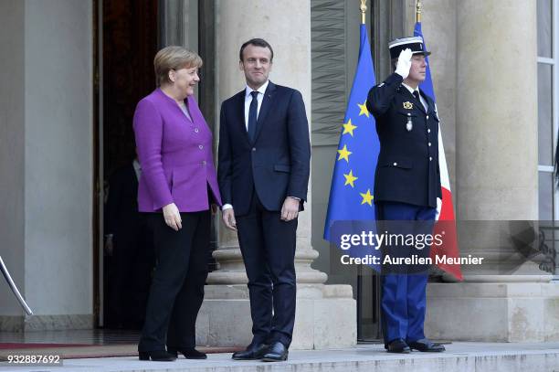 French President Emmanuel Macron receives German Chancellor Angela Merkel at Elysee Palace on March 16, 2018 in Paris, France. Angela Merkel, who...