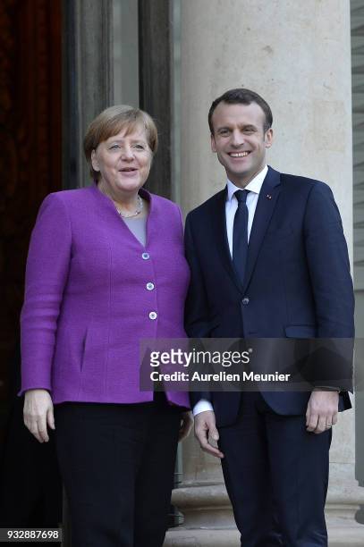 French President Emmanuel Macron receives German Chancellor Angela Merkel at Elysee Palace on March 16, 2018 in Paris, France. Angela Merkel just won...