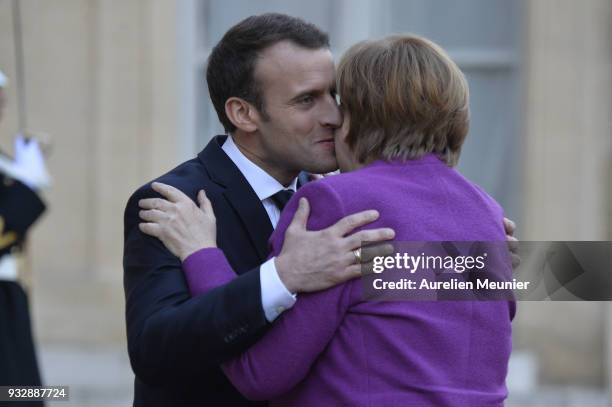 French President Emmanuel Macron receives German Chancellor Angela Merkel at Elysee Palace on March 16, 2018 in Paris, France. Angela Merkel, who...