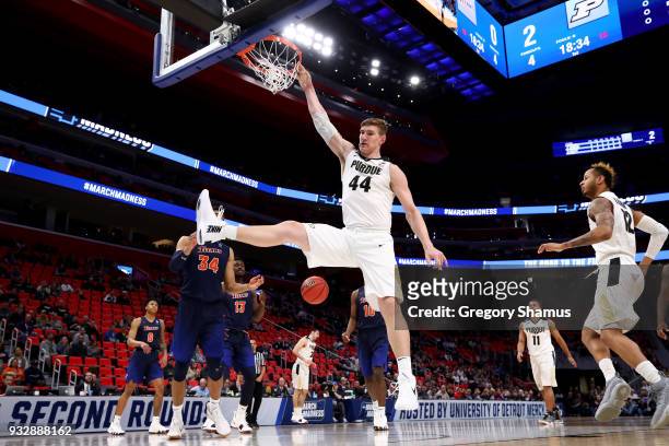 Isaac Haas of the Purdue Boilermakers dunks the ball against the Cal State Fullerton Titans during the first half of the game in the first round of...