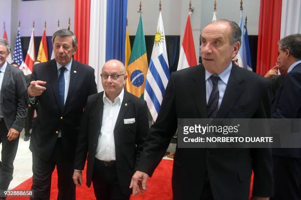 Foreing ministers of Uruguay Rodolfo Nin Novoa, Argentina Jorge Faurie and Brazil Alyosio Nunes, are pictured at the end of a meeting at the...