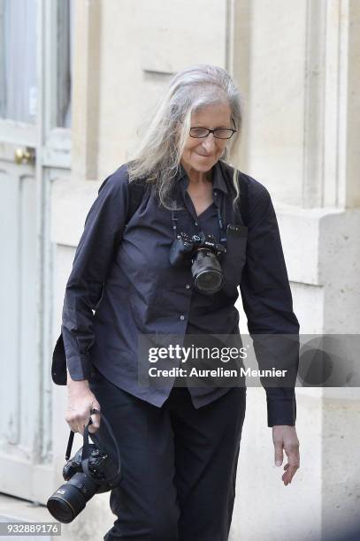 Photographer Annie Leibovitz walks in the Elysee court as French President Emmanuel Macron receives German Chancellor Angela Merkel at Elysee Palace...