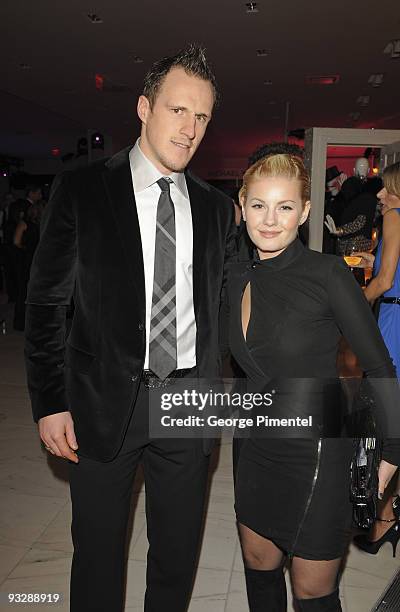 Calgary Flames' defenseman Dion Phaneuf and actress Elisha Cuthbert attend the Holt Renfrew Celebration for their new store in Calgary on November...