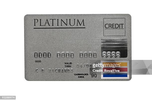 worn platinum credit card - platina stockfoto's en -beelden