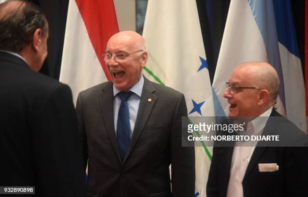 Foreing ministers of Brazil Alyosio Nunes, Paraguay Eladio Loizaga and Argentina Jorge Faurie, share a light moment at the end of a Mercosur's...