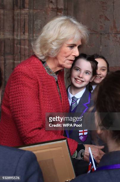 Camilla, Duchess of Cornwall school children at the University of Chester's graduation ceremony in Chester Cathedral where she received an honorary...