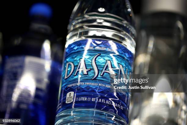 Bottles of Dasani water are displayed on a shelf at a convenience store March 16, 2018 in San Rafael, California. A new study by State University of...