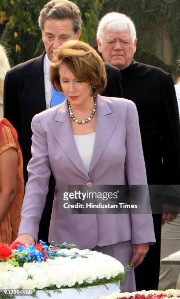 House Speaker Nancy Pelosi and others pays floral tribute at the memorial of Mahatma Gandhi, in New Delhi.