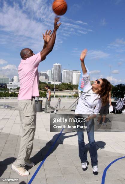 Former NBA player John Salley and Actress Eva Longoria Parker at the Rally for Kids With Cancer pit stop at American Airlines Arena on November 21,...