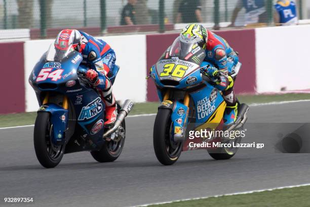 Mattia Pasini of Italy and Italtrans Racing leads Joan Mir of Spain and EG 0,0 Marc VDS during the MotoGP of Qatar - Free Practice at Losail Circuit...