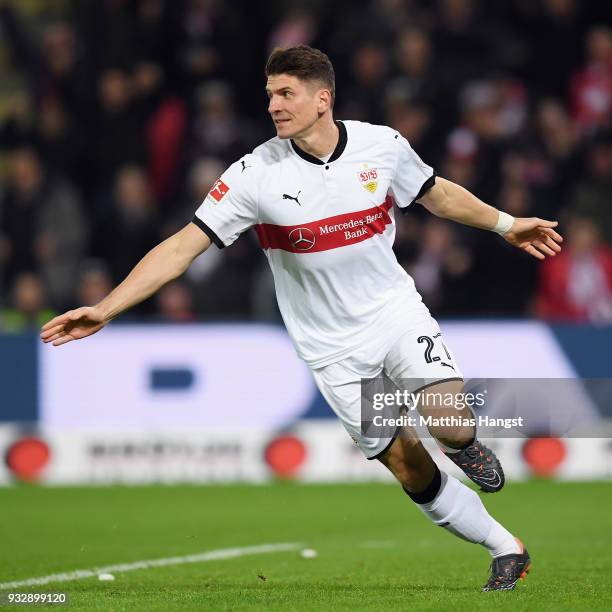 Mario Gomez of Stuttgart celebrates his team's first goal during the Bundesliga match between Sport-Club Freiburg and VfB Stuttgart at...