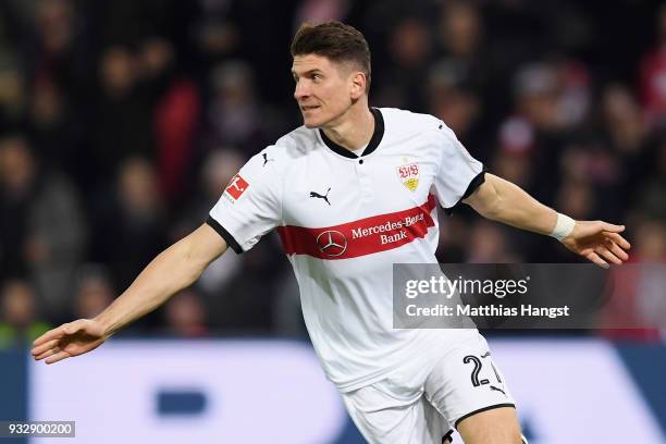 Mario Gomez of Stuttgart celebrates his team's first goal during the Bundesliga match between Sport-Club Freiburg and VfB Stuttgart at...