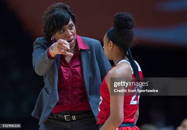 Western Kentucky Lady Toppers head coach Michelle Clark-Heard talks to guard Terri Smith during a game between the Oregon State Beavers and Western...