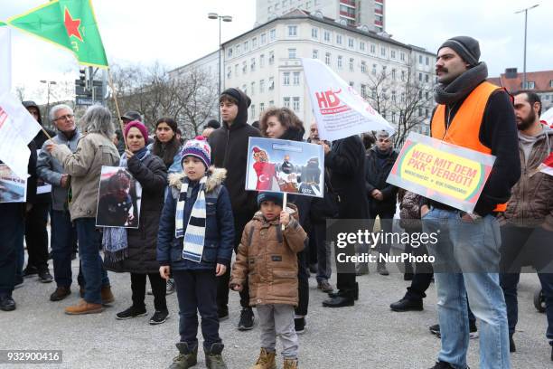 Children with a poster. Hundreds of people demonstrated in Munich, Germany, on 16 March 2018 to remember the chemical attack of Halabja by Sadam...