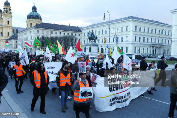 Protestors show pictures of dead children, the flags of the YPG, YPJ and PYD. Hundreds of people demonstrated in Munich, Germany, on 16 March 2018 to...