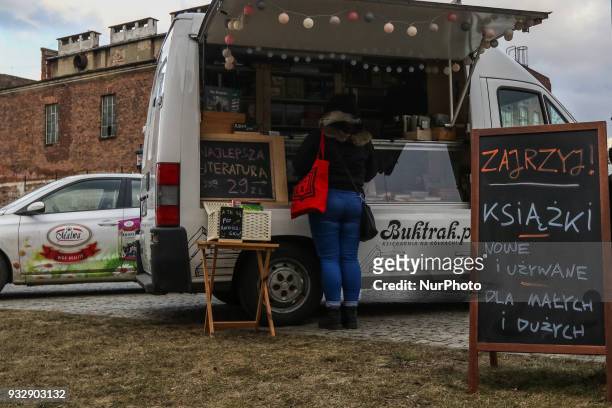 Mr. Michal Alenowicz owner of the Wind from the Sea publishing house is seen selling books in his Fiat Ducato Book Truck in Gdansk, Poland on 16...