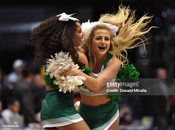 Marshall Thundering Herd cheerleaders celebrate after defeating the Wichita State Shockers during the first round of the 2018 NCAA Men's Basketball...