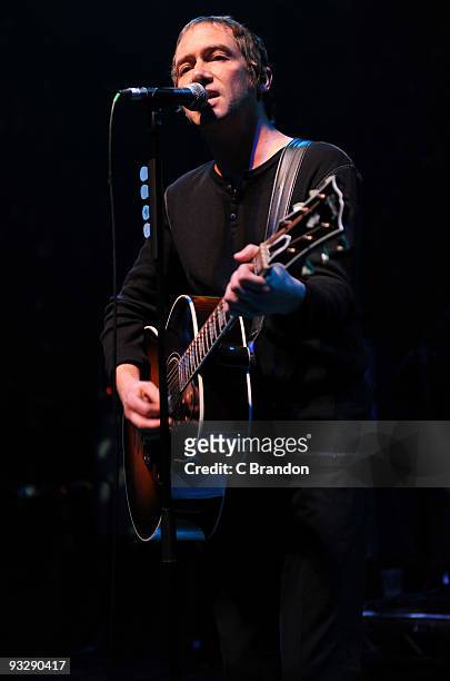 Simon Fowler of Ocean Colour Scene performs on stage at Shepherds Bush Empire on November 21, 2009 in London, England.