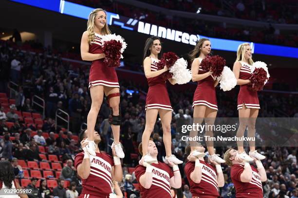 The Arkansas Razorbacks cheerleaders perform in the first round of the 2018 NCAA Photos via Getty Images Men's Basketball Tournament held at Little...