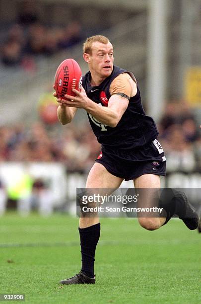 Adrian Hickmott for Carlton in action during the round 16 AFL match played between the Carlton Blues and the Fremantle Dockers held at Optus Oval,...