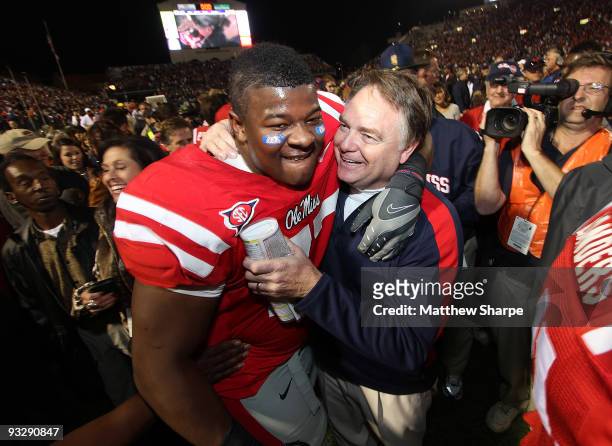 John Jerry and head coach Houston Nutt of the Ole Miss Rebels celebrate a victory over the LSU Tigers at Vaught-Hemingway Stadium on November 21,...