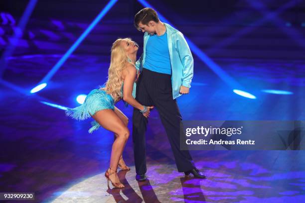 Kathrin Menzinger and Heiko Lochmann perform on stage during the 1st show of the 11th season of the television competition 'Let's Dance' on March 16,...