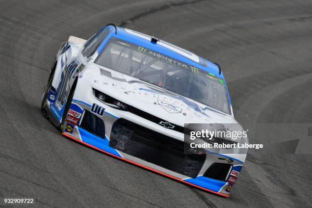 Jeffrey Earnhardt, driver of the VRX Simulators Chevrolet, drives during practice for the Monster Energy NASCAR Cup Series Auto Club 400 at Auto Club...