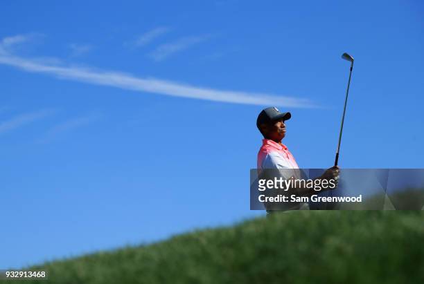 Tiger Woods plays his shot from the 14th tee during the second round at the Arnold Palmer Invitational Presented By MasterCard at Bay Hill Club and...