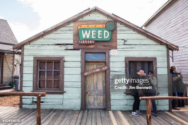 Building jokingly called Wille's Dispensary announces it's closed at the Luck Reunion held on Willie Nelson's ranch on March 15, 2018 in Spicewood,...