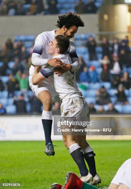 Ben White of England celebrates with Jordan Olowofela after scoring a try during the Natwest Under 20's Six Nations between England U20 and Ireland...