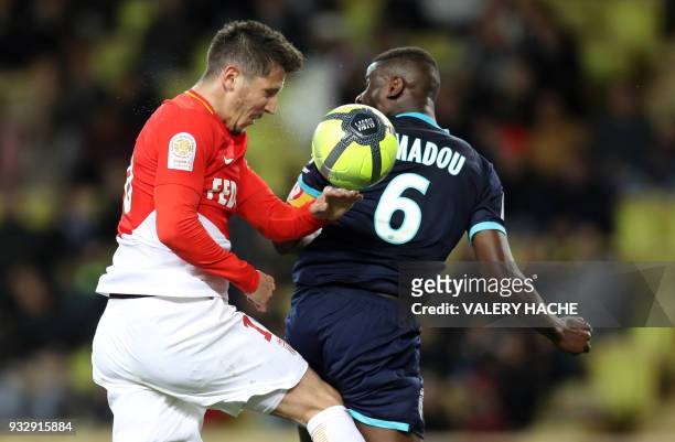Monaco's Montenegrin forward Stevan Jovetic vies with Lille's French midefielder Ibrahim Amadou during the French L1 football match between Monaco...