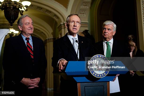 Senate Majority Leader Harry Reid speaks at a news conference as Sen. Chris Dodd and Sen. Tom Harkin look on following the Senate's cloture vote on...