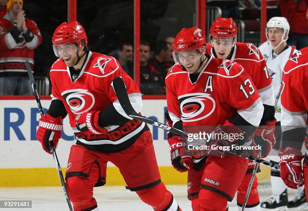 Tuomo Ruutu of the Carolina Hurricanes celebrates his second period goal with teammate Ray Whitney who made the assist during an NHL game against the...