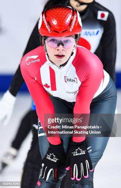 Kim Boutin of Canada finishes first in her group after competing in the women's 1000 meter heats during the World Short Track Speed Skating...