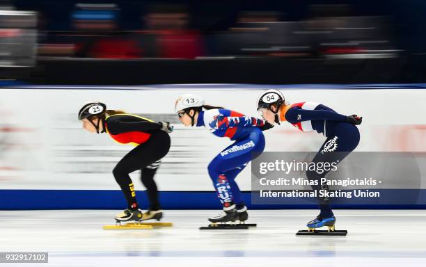 Hanne Desmet of Belgium, Sofia Prosvirnova of Russia and Lara van Ruijven of the Netherlands compete in the women's 1000 meter heats during the World...