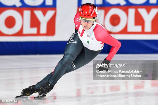 Marianne St-Gelais of Canada competes in the women's 1000 meter heats during the World Short Track Speed Skating Championships at Maurice Richard...