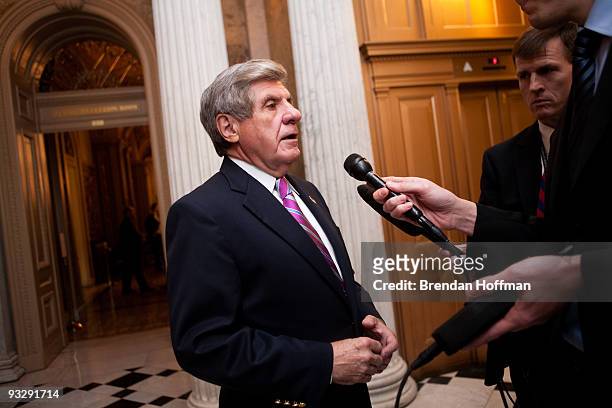 Sen. Ben Nelson speaks to reporters before the Senate's cloture vote on health care reform legislation on Capitol Hill on November 21, 2009 in...