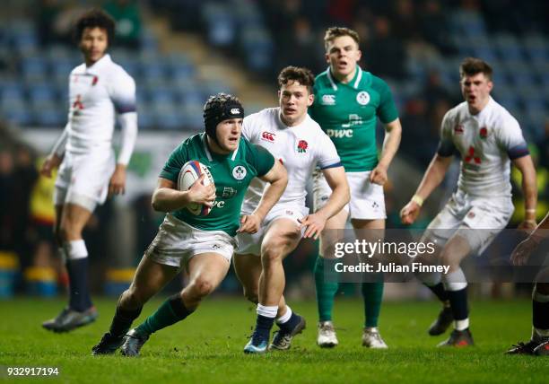 Angus Curtis of Ireland moves away from the England defence during the Natwest U20's Six Nations match between England U20 and Ireland U20 at Ricoh...