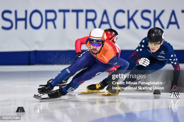 Sjinkie Knegt of the Netherlands competes in the 1000 meter men's heat against John-Henry Krueger of the USA during the World Short Track Speed...