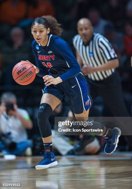 Liberty Lady Flames guard/forward Lela Sellers brings the ball up court during a game between the Tennessee Lady Volunteers and Liberty Lady Flames...