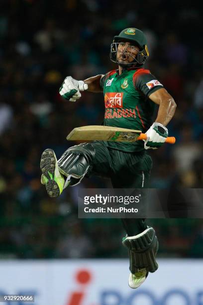 Bangladesh cricketer Mahmudullah Riyad celebrates the win against Sri Lankan cricket team during the 6th T20 cricket match of NIDAHAS Trophy between...