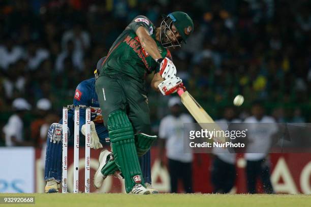 Bangladesh cricketer Tamim Iqbal plays a shot during the 6th T20 cricket match of NIDAHAS Trophy between Sri Lanka and Bangladesh at R Premadasa...